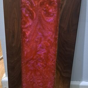 Elegant Wooden Cutting Board with Vibrant Red Inlay